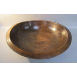 A 19c turned sycamore deep bowl, 45cm diam.