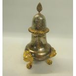 A contemporary mid Georgian style silver sugar shaker with silver gilt highlights including the