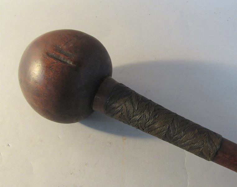 A late 19c/early 20c Zulu carved wood throwing club with ball terminal, the handle wire bound in two - Image 2 of 4