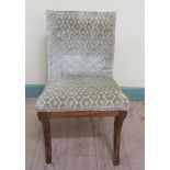 A 19c rosewood upholstered childs chair.