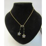 An Edwardian 18ct gold sapphire old cut and rose cut diamond pendant necklace.