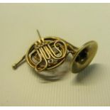 A silver gilt cornet brooch, 4.5cm w.