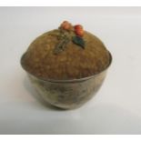 A Christmas pudding pin cushion in a silver bowl, makers mark for S Blanekensee & Son, Birmingham