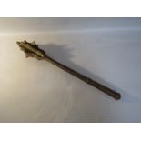 An antique iron mace with a seven flange head, 60cm l.