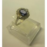 A platinum diamond and sapphire set ring, size P.