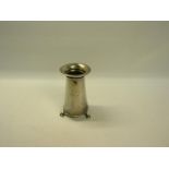 An Edwardian silver spill holder in the form of a churn, supported on three feet, makers mark for