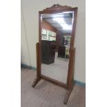 Late 19c/early 20c Arts & Craft influenced oak cheval mirror, the mirror 60cm x 121cm, 76cm w, 159cm