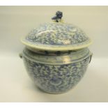 A 19c Chinese tureen and cover, decorated in blue scrolling leaf and flowers, the dome cover with