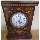 A late 19c French mantel clock in rectangular rosewood case with inlays to front and sides depicting