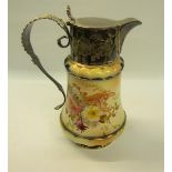 An early 20c Carltonware silver plated mounted water jug decorated on a blush ground with floral