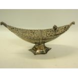 An early Victorian silver spoon warmer of boat shaped form with pierced hinge cover, makers mark for