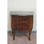 A late 19/early 20c small marble top bombe chest of three drawers with brass fittings supported on