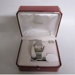 A Cartier Santos midi steel gents wristwatch, serial no. 963566CD sold in 2014 and having a