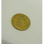 A 1827 shield back gold sovereign.