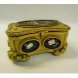A French 19c ormolu jewel casket decorated with five pietra dura floral panels, all of oval form.