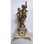 A late 19c French figural mantel clock the gilt spelter statues by E J Ferrand depicting Eros and