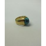 A gold Turquoise set ring