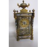 A late 19c French four glass mantel clock in glazed brass case inlaid with blue ground champlevé
