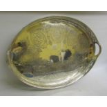 A silver plate two handled galleried oval tray supported on four garland pierced legs. 57cms w.