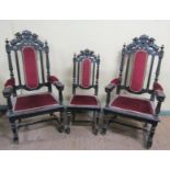 A late Victorian set of eight (6 +2) oak dining chairs, ebonised, all with lion and shield