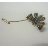 A gold Butterfly brooch set with diamond, ruby, sapphire and pearls, with a safety chain. Brooch 4.