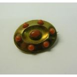 A gold Coral bead set memoriam brooch, 3cms w. Total weight 8.4g.