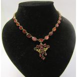 A gold and Spinel set necklet with pendant, 40cms l.