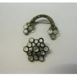 An early 20c marcasite and moonstone set crescent brooch together with a pendant brooch of