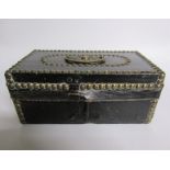 A George III leather and brass studded small trunk, paper lined and with a label Charles M Domett.