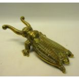 A late 19c cast brass beetle boot pull 28cm l.