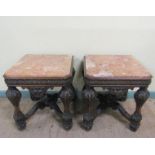 A pair of 19c Continental marble top low tables on carved wood and stucco decorated frames, each