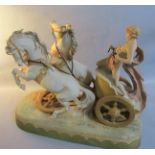 A large late 19c Royal Dux figure group depicting a man riding a chariot drawn by two horses no.