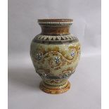 A 19c Doulton Lambeth George Tinworth vase of baluster form, decorated with seaweed design and