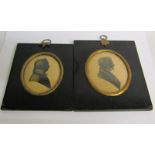 Two 19c black on white silhouette portraits of gentleman, oval framed and glazed. 8.5cms x 7.5cms.