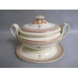 A Wedgwood oval cream ware soup tureen, cover and stand of oval form. The two handled tureen with