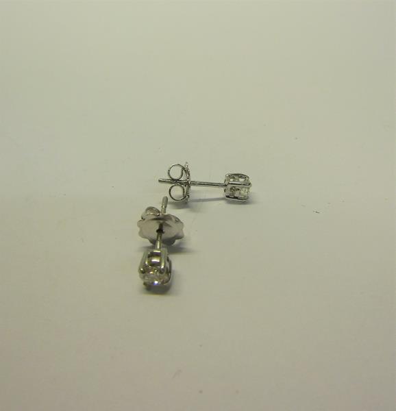 An 18ct gold diamond stud earrings, approx 1/2 carat total. - Image 3 of 5