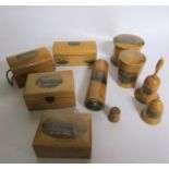 A collection of seven mauchline ware boxes together with acorn thimble holder, a thimble and a
