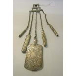 A Victorian silver chatelaine Birmingham 1898 with five tools, one aide memoire with silver covers