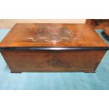 A late 19c Swiss music box playing 30 airs with a 42 tooth comb. The walnut veneered box has the