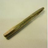 A Waterman 9ct gold engine turned fountain pen. 13.5cms l.
