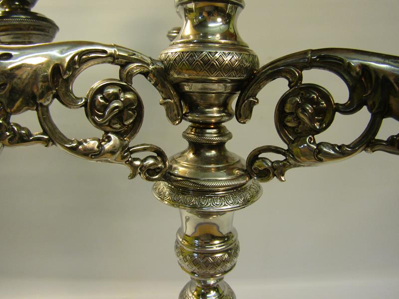 A pair of 19c silver three branch candelabra's with knot fluted tapering columns and raised on - Image 3 of 6