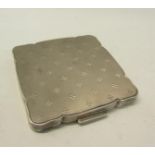 An art deco period German silver compact, engine turned. 925 sterling. 7cms sq.