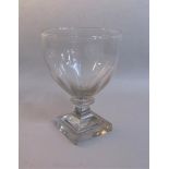 An English square based rummer on a single knop faceted stem. The bowl half facet engraved. 13.