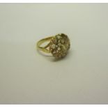 A gold Diamond cluster ring - ring size O/P