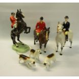 A Beswick hunting group comprising huntsman on rearing horse model no. 868 - 25.5cms h, huntsman