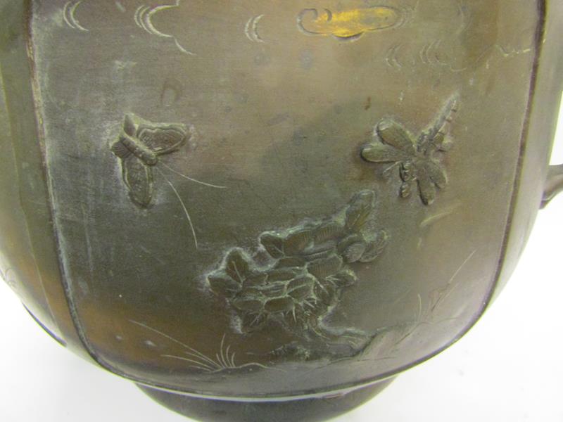 A 19c Oriental patinated bronze jardinere of bulbous form with Elephant trunk side handles and - Image 5 of 8