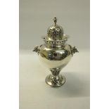 A mid Victorian silver sugar caster of baluster form with fox head side mounts. Flared and
