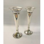 A pair of silver trumpet vases with pierced and flared upper rims. Makers mark for Edward