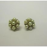 A pair of gold Pearl and Diamond set earrings