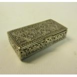 A Continental silver snuff box of rectangular scroll and leaf decorated form with hinged cover. 5.